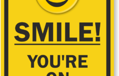 Smile You re On Camera Sign Video Security Signs SKU K 8382